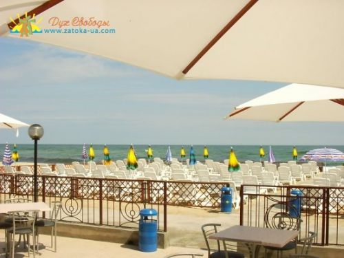 База отдыха Солнечная летняя площадка ресторана Солар и пляж фото